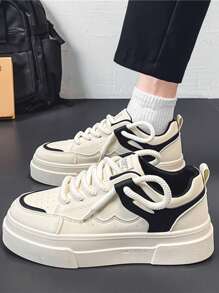 男士时尚厚底运动鞋，优质皮革拼接设计，醒目的黑白拼色，绳状鞋带增添个性化，低帮平底，休闲风格，百搭乳白色调，适合所有季节，日常穿着出众