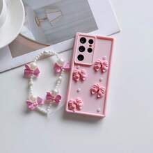 粉色蝴蝶结元素时尚DIY心形手机壳，兼容 16/15 PRO MAX/15 PLUS/15 PRO/15/14 PRO MAX/14 PLUS/14 PRO/14/13 PRO MAX/13 PRO/13/12 PRO MAX/12 PRO/12 PRO MAX/11 PRO/11/XS MAX/XR/XS/7/8 PLUS，透明防震保护壳，带粉色仿珍珠蝴蝶结，附赠蝴蝶手链。兼容三星Galaxy A14 A34 A54 A15 A25 A35 A55 S23 S23Plus S23ultra S23fe S24 S24plus S24ultra S24fe S25 S25plus S25ultra，防水防摔防刮，春季礼物派对佳品，国际版，非国内版。 - 粉色 - 查看 3
