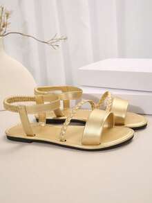 加大码女式编织露趾舒适简约松紧带平底皮革一脚蹬凉鞋，夏季休闲时尚户外沙滩鞋 - 金色 - 查看 3