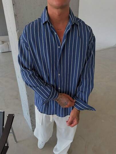 男士藍白條紋長袖休閒襯衫，寬鬆版型，百搭簡約設計，適合多季節日常穿著，舒適透氣，亞麻質感，秋季，休閒正裝