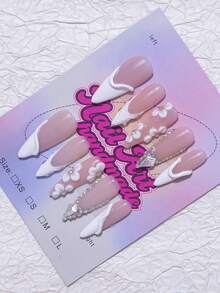手工杏仁形 Y2K 法式美甲贴，裸色和白色可选，饰有水钻、圣人、十字架、钢珠和仿珍珠元素。10 片/包，3 种尺寸，适合派对、婚礼和日常佩戴。包含工具包，是送给女士和女孩的绝佳礼物。Press On Nails 美甲用品 美甲 - Follow Your Heart - 查看 3
