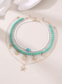 Set di 3 collane alla moda da spiaggia con conchiglie, stelle marine e perle finte, adatte per l'uso quotidiano e per le vacanze delle ragazze
