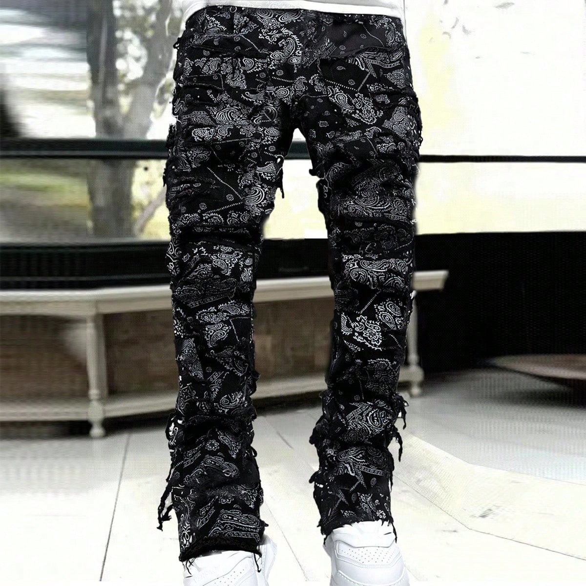 Jeans de corte slim con estampado todo sobre y flecos de moda para adolescentes