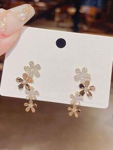 1 par de pendientes glamorosos con borlas florales brillantes y rhinestones