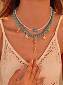 Set di 3 collane alla moda da spiaggia con conchiglie, stelle marine e perle finte, adatte per l'uso quotidiano e per le vacanze delle ragazze