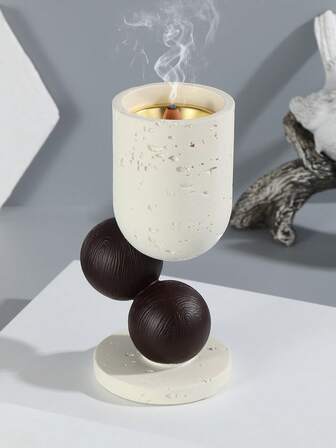 这款树脂香炉采用简约几何图案设计。香座、家居香氛、家居装饰，适用于家居装饰、卧室、客厅（可作为中心装饰）、办公室、瑜伽馆和派对，营造优雅氛围。也可用于寺庙装饰。这款香炉是节日馈赠、返校礼物、毕业礼物或馈赠女士的理想之选。