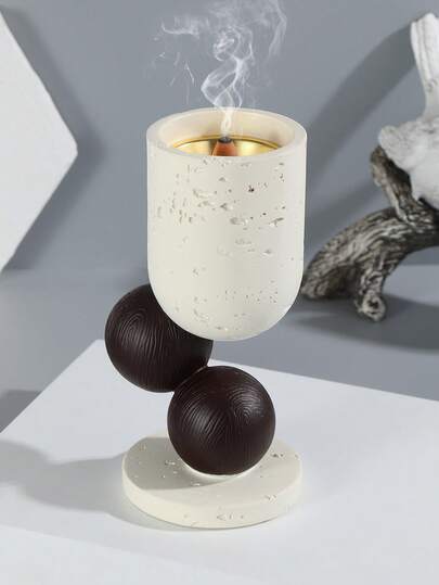 这款树脂香炉采用简约几何图案设计。香座、家居香氛、家居装饰，适用于家居装饰、卧室、客厅（可作为中心装饰）、办公室、瑜伽馆和派对，营造优雅氛围。也可用于寺庙装饰。这款香炉是节日馈赠、返校礼物、毕业礼物或馈赠女士的理想之选。