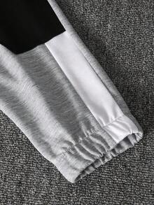 Set da 2 pezzi: felpa con stampa di lettere a maniche lunghe e pantaloni con tasche a righe, moda casual per bambini di 7-11 anni, adatto per attività all'aperto e sport scolastici