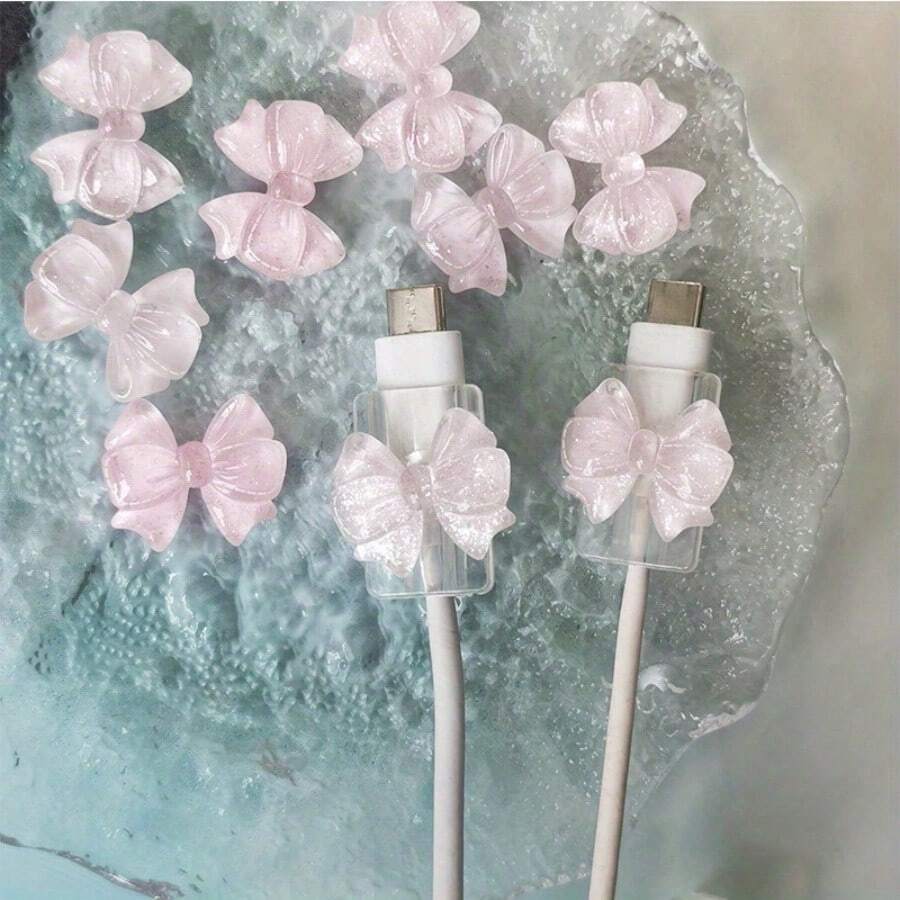 [Protector de cable duradero] 2 piezas Protector de cable USB rosa duradero con diseño elegante para accesorios de teléfono - Protector de cable de plástico con adorables acentos de lazo, protector de cable para cables de carga - Conjunto multicolor de 2 piezas - Ver 1