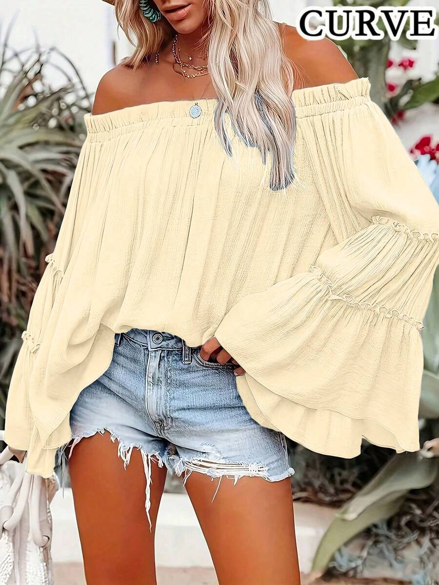 Bluzka damska w jednolitym kolorze z odkrytymi ramionami i rozszerzanymi rękawami, plisowana, w dużych rozmiarach