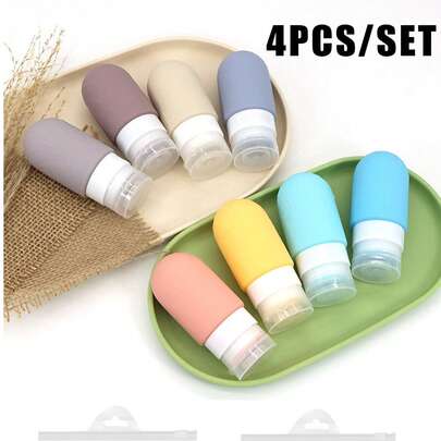 수납 가방이 있는 4피스 여행용 병 세트, 리필 가능한 실리콘 세면도구 용기, 샴푸, 컨디셔너, 로션 리필 병, 여행용 리필 병 빈 병 스킨 케어 샤워 젤 샴푸 화장품 짜기 휴대용 실리콘 병 세트, 공간 절약, 여행 필수품, 외출 필수품, 출장 필수품. 여행 필수품 휴