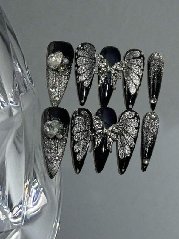 10 pièces Ongles français noirs, ensemble d'ongles à pression 3D avec papillon métallique, effet œil de chat, ailes de papillon peintes à la main avec taches blanches, décoration 3D de strass, faux ongles couvrants pour femmes et filles, ongles gothiques, ongles amande, faux ongles à pression acryliques, fournitures pour ongles acryliques