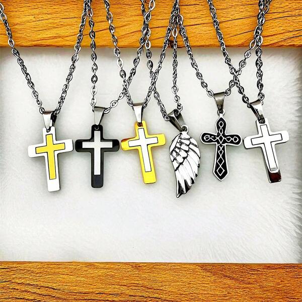 不锈钢吊坠：十字架与羽毛 - 永恒的优雅与灵性，是佩戴者、精神探索者和珠宝爱好者在休闲外出、教堂礼拜、约会之夜以及婚礼和周年纪念日的理想选择。