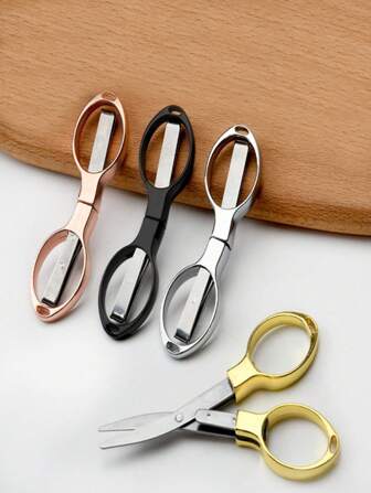 1 pezzo Forbici pieghevoli, strumento pratico multifunzionale per artigianato, compatto e portatile, adatto per artigianato, forniture per ufficio. Forbici mini a forma di occhio creative, ottimo regalo per amici e famiglia. Ideale per viaggi e uso domestico, accessori da viaggio | Forbici compatte | Strumento da taglio durevole, forbici per artigianato. Colore e stile casuali