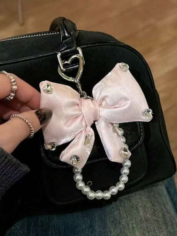 Nouveau breloque de téléphone coloré 3D avec perles, nœud et strass brillants. Pendentif unique pour sac/porte-clés