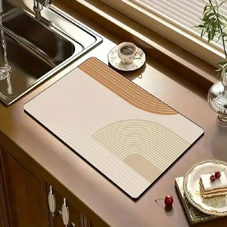 橙色印花沥水垫，图案可个性化定制。这款新型吸水厨房台面沥水垫表面不易褪色，触感柔软舒适。支持机洗，方便清洁，轻巧便携。 - 橘色 - 查看 4