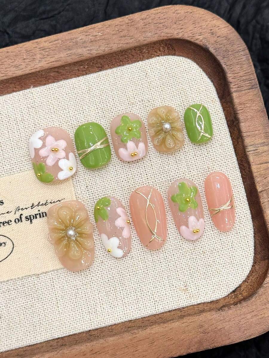 10 件短圆形/椭圆形手工按压指甲,淡粉色绿色 3D 浮雕花朵金箔线条,日式清新花园假指甲,带果冻胶和指甲锉,适合夏季、返校、节日派对和日常美甲用品 - 綠色 - 查看 1