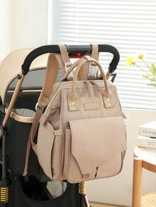 1 件多功能大容量妈咪包，轻便时尚尿布包可挂在婴儿车上