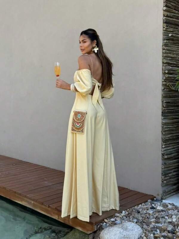 O look que traduz elegância tropical com atitude!  O Macacão Itacaré é puro charme para dias de verão com estilo.  Modelagem com manga bufante e decote ombro a ombro Detalhe de amarração nas costas que valoriza a silhueta  Conforto e impacto visual em uma única peça. Ideal para suas clientes que amam se destacar com estilo e personalidade!