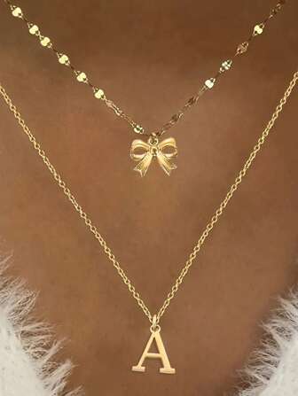 2 件欧美时尚简约不锈钢蝴蝶结吊坠项链，26 个字母吊坠项链套装，适合女性日常和派对佩戴