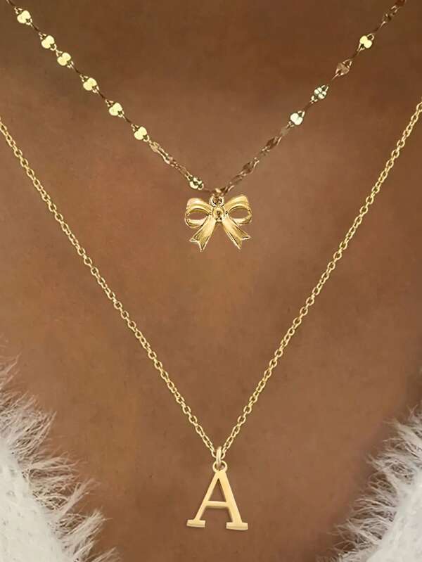 2 piezas Conjunto de collares con colgante de lazo minimalista de acero inoxidable de estilo europeo y americano, collares con colgante de 26 letras, adecuado para uso diario y de fiesta de mujeres