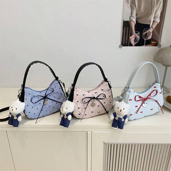 Nuevo bolso de mano en forma de media luna para primavera/verano, bolso bandolera con lazo, estampado de lunares, acolchado, diseño de burbuja y nube, elegante bolso baguette para debajo del brazo, versátil bolso tote para uso al aire libre y para ir al trabajo para mujeres