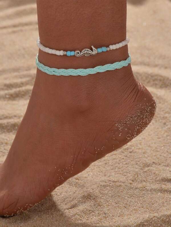 A 2 Pieces Bohemian Beach Style Women's Foot Chain With Rice Beads Strung Together And Seahorse Woven