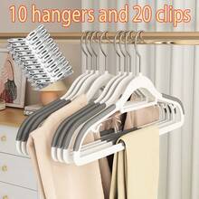 Juego de 30 piezas - Incluye 10 perchas de plástico antideslizantes + 20 pinzas de acero inoxidable, resistentes y duraderas, con perchas giratorias, adecuadas para secar, almacenar y organizar ropa del hogar en primavera y verano, y aplicables a dormitorios, baños y familias.