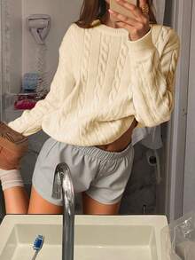 Pull à col rond minimaliste de couleur unie avec torsade, manches longues, épaules tombantes, édition du Nouvel An, mode femme