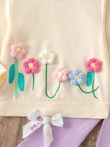 Conjunto de blusa de manga larga con estampado floral lindo y pantalón acampanado para niñas