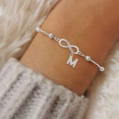 1 pièce Nouveau bracelet à chaîne en acier inoxydable doré avec symbole infini et initiale sertie de zircone cubique, mode femme