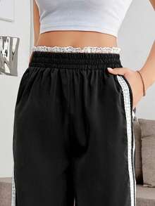 Pantalón de mujer unicolor cómodo para uso casual con rayas laterales de encaje - Negro - Ver 3