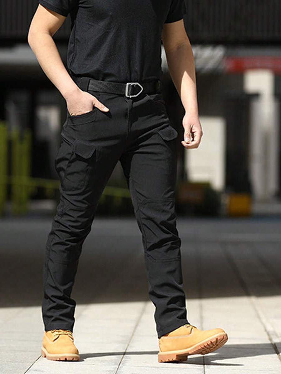 Pantalones tácticos multibolsillos para hombre están hechos de tela duradera y resistente al agua y cuentan con bolsillos laterales y cremalleras. - Negro - Ver 1