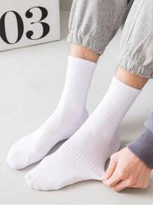 10 pares de calcetines casuales personalizados de estilo callejero con estrellas de cinco puntas en blanco y negro, simples y de moda, versátiles y cómodos para uso casual y de negocios, adecuados para deportes, cálidos en otoño e invierno, calcetines largos hasta el tobillo para parejas.