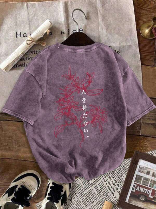 T-shirt à manches courtes de style décontracté lavé pour hommes, avec motif de dessin animé créatif. Confortable pour le port quotidien, convient pour sortir et rester à la maison en été.