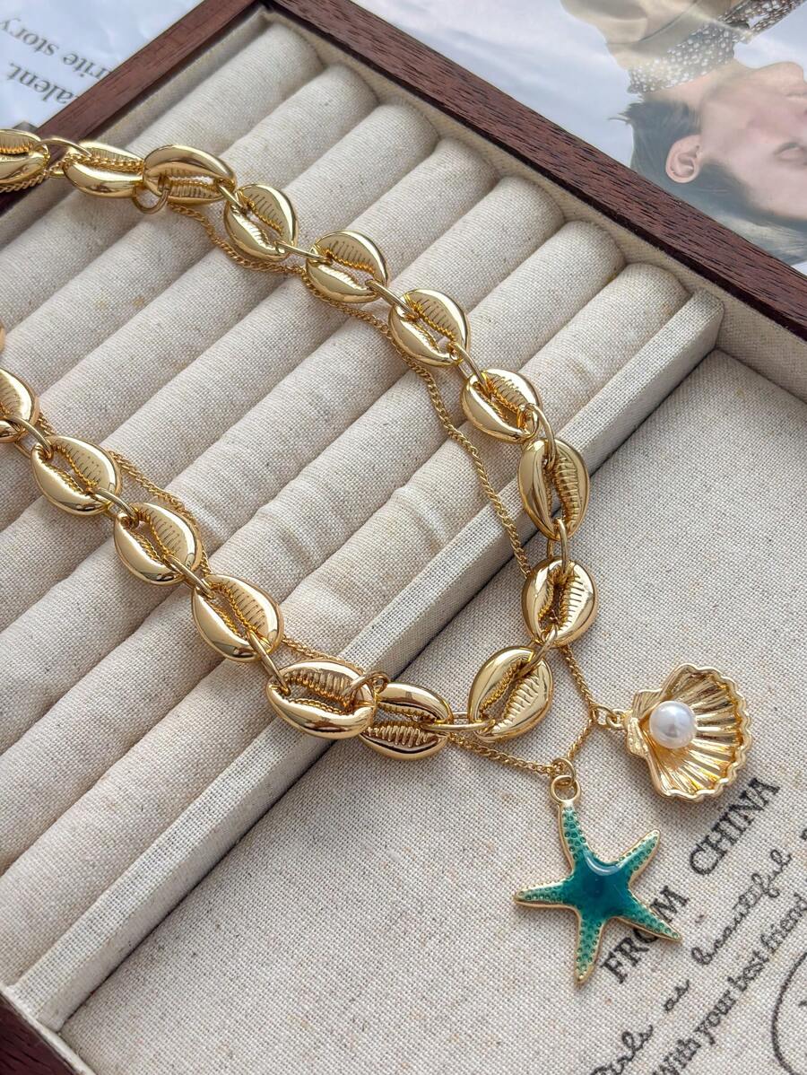 طقم قلادة متعدد الطبقات بطراز بوهيمي به نجوم وأصداف البحر ، مناسبة للارتداء اليومي وحفلات وأزياء الشاطئ