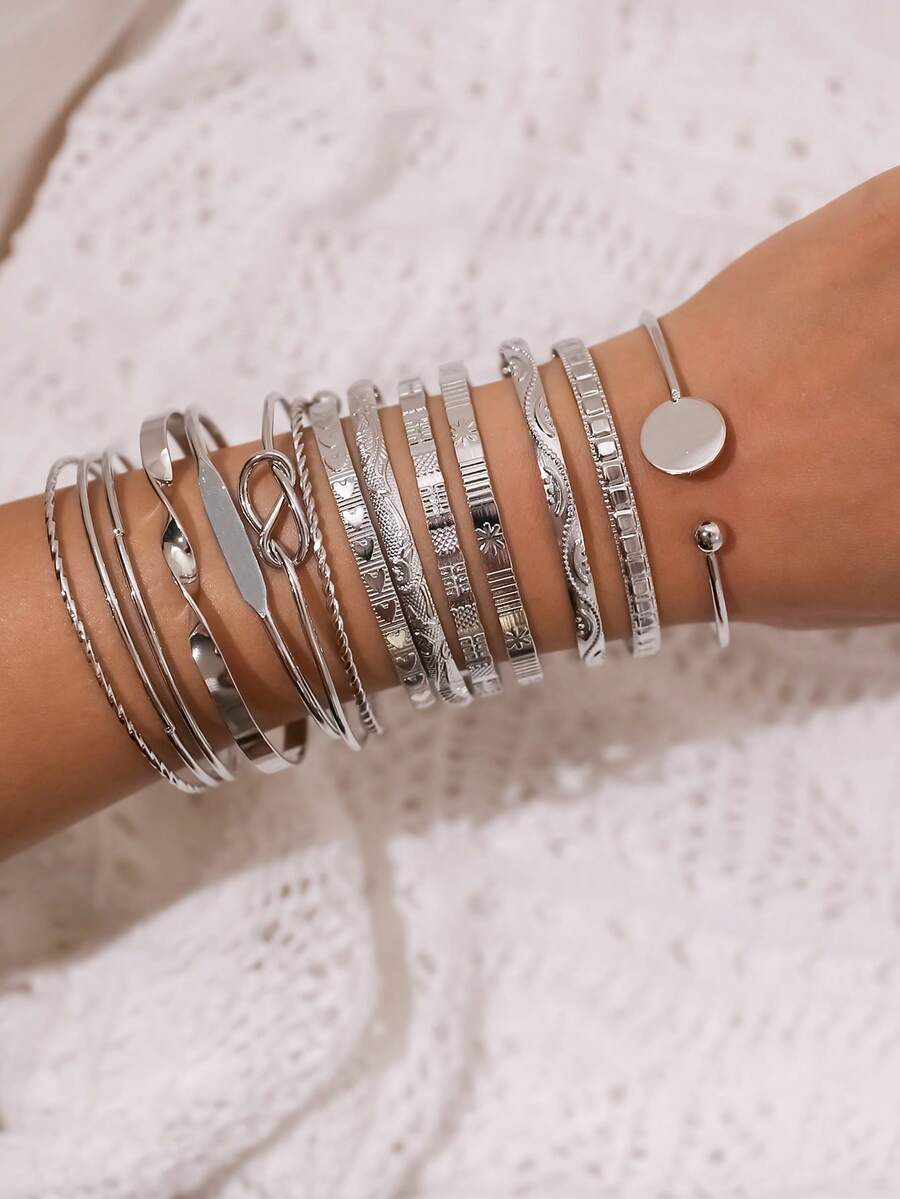 Set de 12 pulseras con diseños de estilo europeo y americano de moda, que incluye flechas, flores, hexágonos exagerados y pulseras multicapa ajustables, un regalo de joyería - Plateado - Ver 1