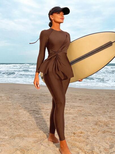 مجموعة بوركيني سباحة من ملابس علوية كم طويل بلون واحد مع تويست في الخصر وبنطلون للشاطئ والعطلات