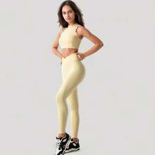 Women's High Neck Scallop Edge Sports Bra With Sleeveless Cut And Stylish Back Detailing For Light Activity - Small, Yellow - Màu vàng - Xem 3