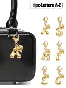 泡泡字母可爱项链吊坠包吊坠-幸运水晶吊坠搭配金色心形吊坠，字母 A-Z，闪亮合金包和背包吊坠-生日和特殊场合的完美礼物，钥匙链环包背包吊坠汽车吊坠礼物，适合女士和女孩，钱包和手提包配件。生日、情人节、母亲节送给女性的小礼物 - 金色 - 查看 1