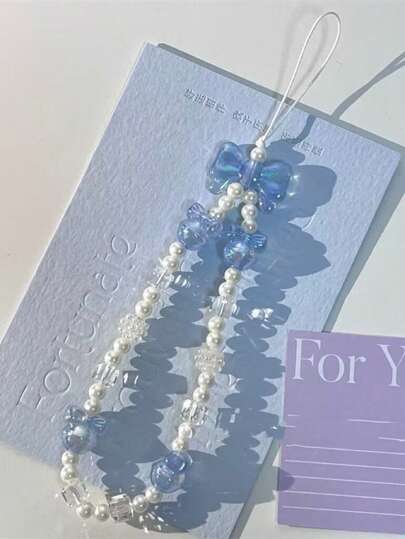 1 Stück modischer minimalistischer blau-weißer Schleifen-Perlen-Handyschlaufe, geeignet als Geschenk für jeden Anlass