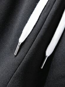 Pantalones sanitarios modernos y modernos para hombre con estampado de contraste de color y patrón de llamas, pantalones para hombre con diseño de contraste de color con cordón, tela de poliéster transpirable y antitranspirante, con bolsillos y cintura elástica, estilo callejero underground, patineta, hip-hop y rap. - Negro - Ver 5