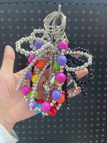 قطعتان من سحر الحقيبة بشكل فيونكة فضية، سلسلة حقيبة من اللؤلؤ الاصطناعي، قلادة محفظة، ديكور حقيبة اليد، سلسلة مفاتيح محفظة، اكسسوارات حقيبة، سحر حقيبة يد مصمم جميل، ديكور حقيبة DIY، مناسب لحقائب Bogg - الأسود - مشاهدة 9