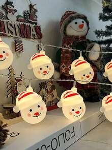 1 buc 1.5m 10 lumini LED de Crăciun lumini decorative Moș Crăciun om de zăpadă șir de lumini de Crăciun decorațiuni pentru brad de Crăciun potrivite pentru petrecerea de Crăciun sufragerie dormitor și cameră decorare recuzită de lumini cu pălării de Moș Crăciun, ideale pentru brad de Crăciun, casă de vacanță și decorațiuni de petrecere (bateriile nu sunt incluse, necesită baterii AA)