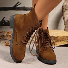 Bottes polyvalentes de mode pour femmes, de couleur unie. Bottes de cheville à bout rond rétro avec lacets et bottines courtes