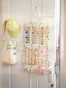 1个发饰收纳挂袋，可爱发夹收纳壁挂袋，儿童发饰收纳架，发夹展示收纳架，发带收纳展示袋，可收纳眼镜、发夹、发带、手表等多用途收纳挂袋。可折叠，易于打理，可悬挂于任何位置，节省空间。 - 彩色 - 查看 3