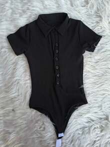 BODYSUIT WITH BUTTONS 2025 - Black - View 1