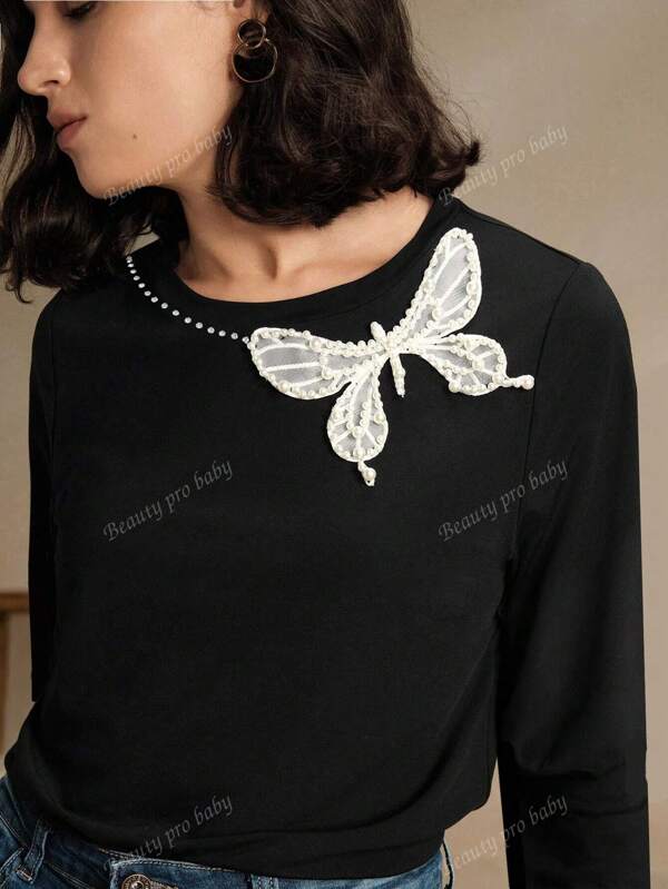 Camiseta elegante con lazo de strass para talla grande