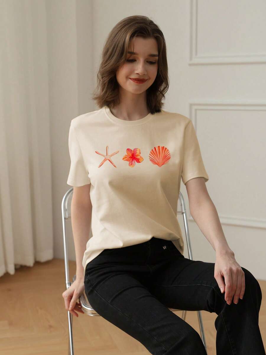 Summer Apricot Short Sleeve Top, Decorated With Shell And Starfish Patterns. Loose Style, Easy To Match, Perfect For Casual And Vacation Wear.