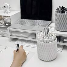 1 hộp đựng bút xoay để bàn, dung tích lớn và thiết kế trang nhã, phù hợp cho học sinh/văn phòng, phong cách tối giản. - A - Xem 9